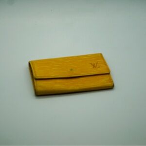 Louis Vuitton Yellow Leather Key Chain Holder Textured Compact Logo Accent